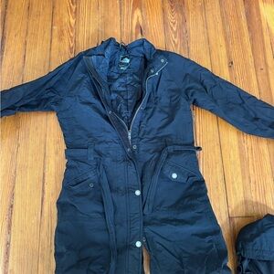 Black Winter Northface Jacket with Pockets, Removeable Hood, and Belt